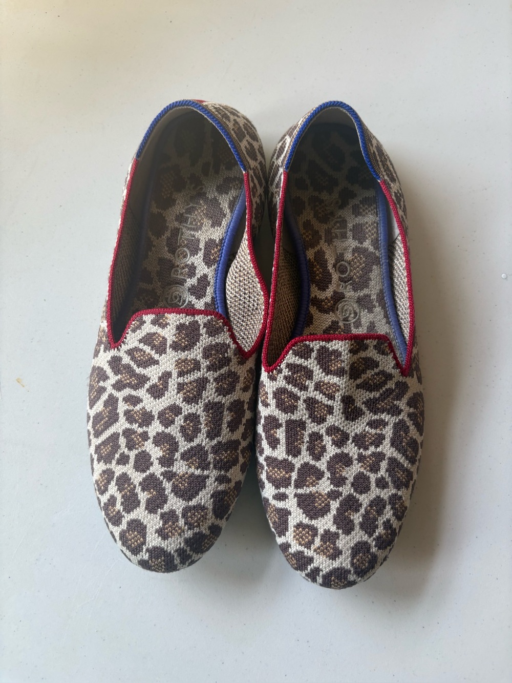 Rothy's Leopard Print Flats with Red and Blue Trim